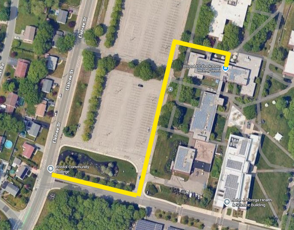 Campus map showing route from parking lot to Building C with yellow line