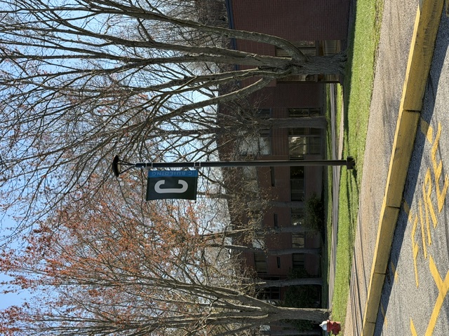 Building C and K signs, campus path